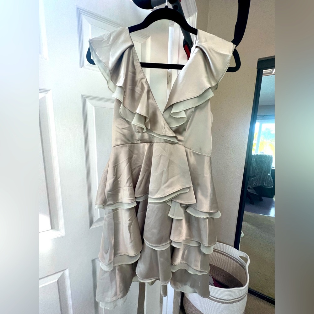 Women’s size small cocktail dress. Mini. Flowy. V neck. More champagne color.